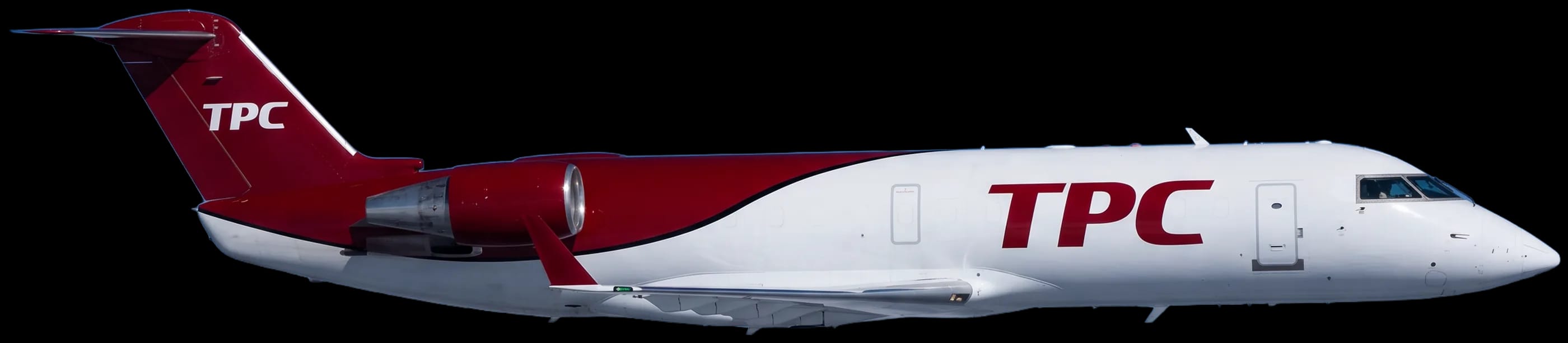 TPC's CRJ200SF freighter in flight above the clouds